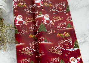Rouleau papier cadeau pere noel